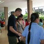 Kred Trakarn Home - handing out fried chicken
